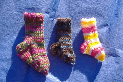 three tiny socks