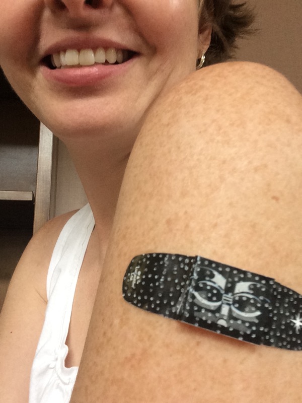 My flu shot is modeling the aforementioned bandaids.
